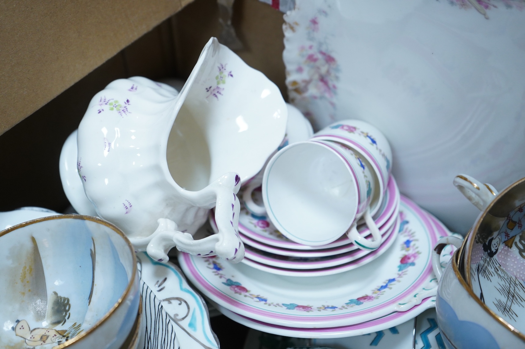 A large collection of various ceramics to include a Ridgways Homemaker plate, Japanese tea set and stoneware jugs